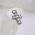 Colgante cruz con zircon - Kathe Piercing