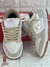 Tênis Nike Dunk Low phantom metallic gold na internet