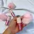 Imagem do Lip Gloss Shiny Chaveiro Com Pom Pom Coração- Bobbi Rara