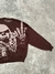 Sweater "calavera" marron en internet