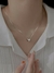 Collar de cadena con adorno de corazón