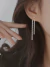 Aretes largos con diamante