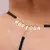 Imagem do Fio Dental Renda Preta Palavras Strass Tallyta