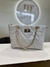 Bolsa beige cadena