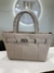 Bolsa broche plateado en internet