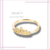 Anillo con corona de zirconias baño L-14k