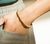 Bracelete Rígido Corda banhado a ouro 18K na internet