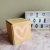 Caja bolsa corazon, con manija de seda