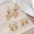Trio de Brincos Argolas Cruz Radiance - - comprar online