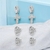 Trio de Brincos Argolas Cruz Radiance - - comprar online