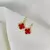Brinco trevo vermelho banhado a Ouro 18K