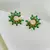 Brinco meia lua cravejado de pedras verdes banhado a Ouro 18K