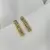 Brinco articulado cravejado de pedras transparente banhado a Ouro 18K