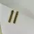 Brinco articulado com pedras roxas banhado a Ouro 18K