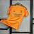 camisa-real-madrid-away-reserva-segunda-dois-24-25-laranja-adidas-masculina-vinijr-rodrygo-mbappe