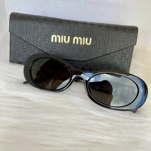 ÓCULOS MIU MIU