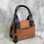 Cartera rígida JOUP con hebillas - comprar online