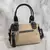 Cartera rígida JOUP con hebillas - tienda online
