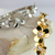 Bracelete Pulseira Flores com Miolo Strass na internet