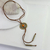 Colar Cordão Couro Broche Ouro Velho Pedra Caramelo - comprar online