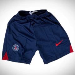 Shorts de fútbol para niños del PSG, color azul marino con detalles en rojo y logo de Nike.