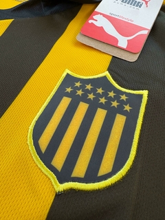 Camiseta Puma de Peñarol Titular 2025 - Lírico Showroom - Tienda Online de Fútbol 