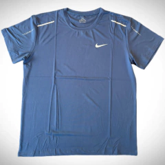 Remera Deportiva Nike Tela Dry Fit Azul Petróleo - comprar online