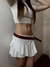 short pollera blanco.