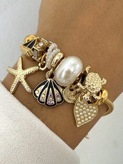 Pulsera Pandora acero dorado modelo 12