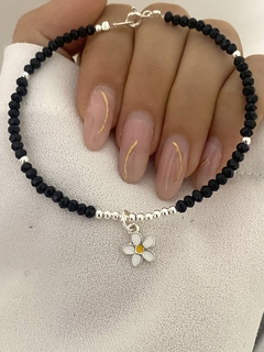 Pulsera cristal negra y margarita en internet