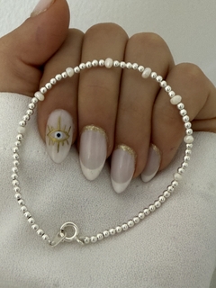Pulsera bolitas y perla de rio natural 1,5cm