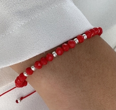 Pulsera hilo rojo con cristal y bolita ajustable