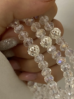 Pulsera cristal 6mm transparente y bolita calada (elastizada)