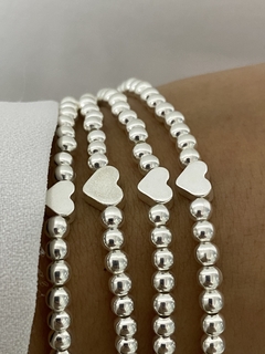 Pulsera modelo 16 bolitas 4mm y corazon (c/cierre) en internet
