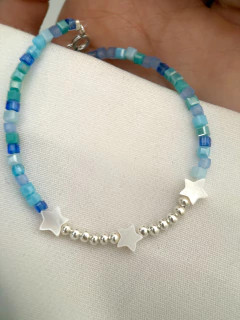 Pulsera cubitos celeste con estrella de nacar (18 cm) - comprar online