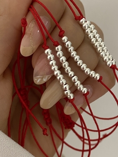 Pulsera de hilo y bolitas de plata - comprar online