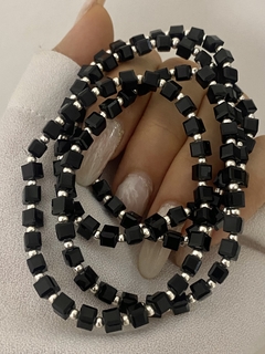 Pulsera cubito elastizada negra en internet