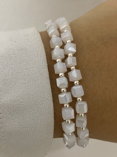 Pulsera cubito blanca tornasol (elastizada) en internet