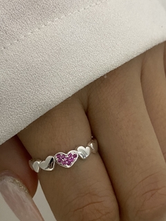 Anillo 7 corazones y cubic fucsia