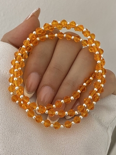 Pulsera cristal naranja bicono translucido y bolita 1x1 (elastizada)