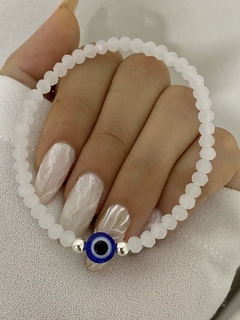 Pulsera cristal elastizada blanca y ojo azul