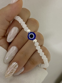 Pulsera cristal elastizada blanca y ojo azul - comprar online