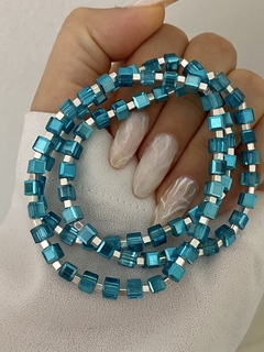 Pulsera cristal cubo celeste y cubito de plata