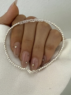 Pulsera bolitas plateadas y cristal cubo transparente