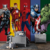 Papel de Parede Super-Heróis Clássicos com Fundo Dividido em Cores Para Quarto e Sala
