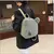 Mochila feminina c/ orelha de lã, pequena e casual