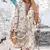 vestido com estampa vintage com gola em v na internet
