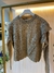 sweater verde con volados al frente