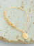 PULSEIRA PINGENTE GATO FOLHADO A OURO