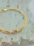 PULSEIRA COM DETALHE CENTRAL CRAVEJADO FOLHEADO A OURO - comprar online